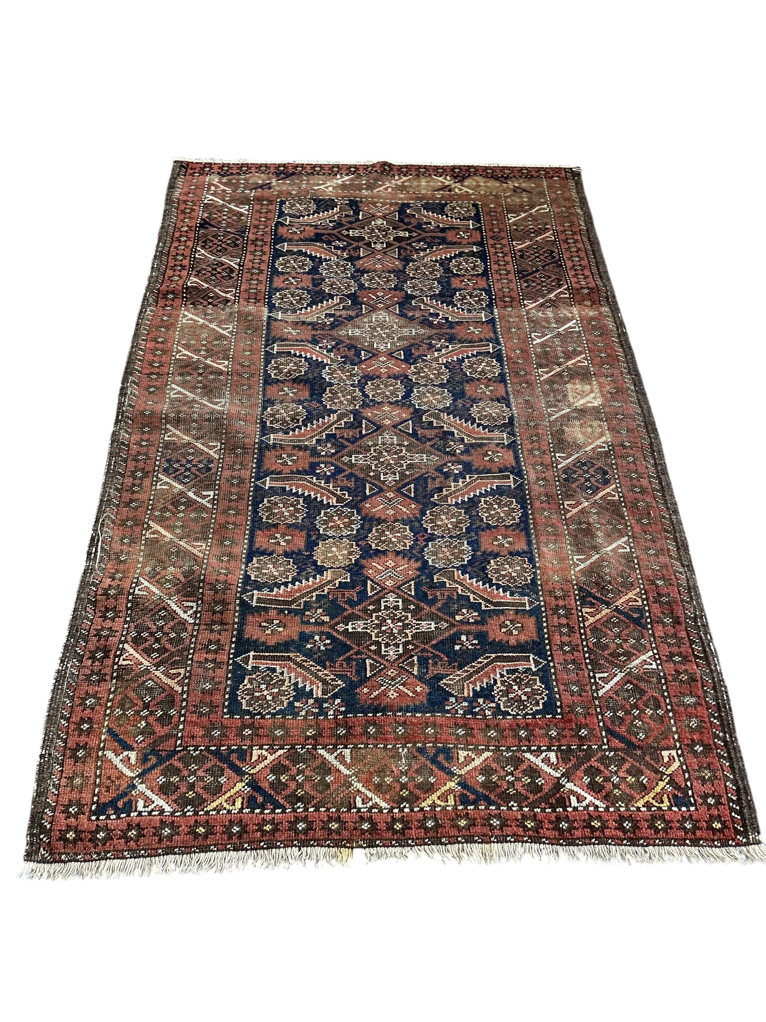 A late 19th century North West Persian blue ground rug, 206 x 123cm